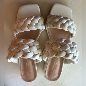 Brand new, never worn white sandals with small heel.